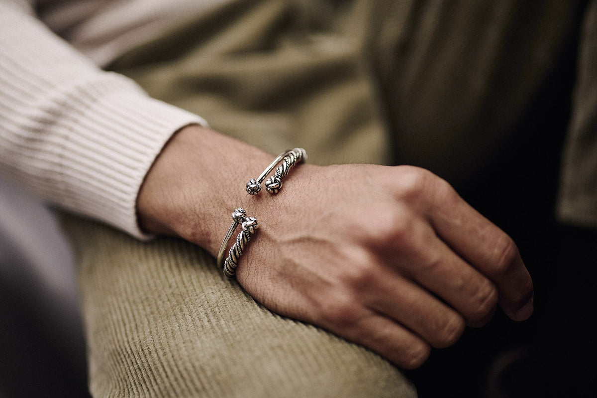 Person wearing a silver Lenrok bracelet
